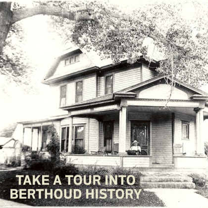 Old home with a man sitting on the porch
