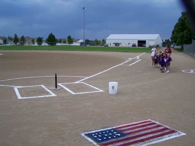 People Pledging Allegiance to the Flag at Bein Baseball Complex